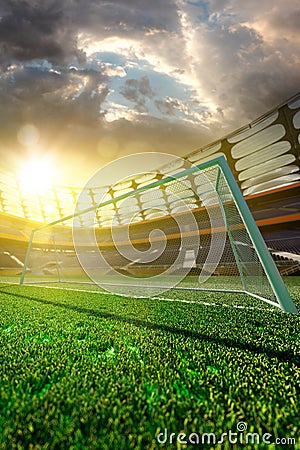 Empty soccer stadium in sunlight Stock Photo