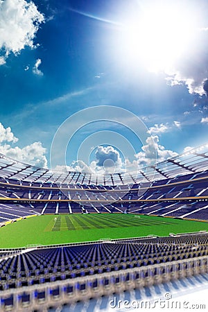 Empty soccer stadium in sunlight Stock Photo