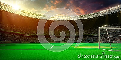 Empty soccer stadium in sunlight Stock Photo