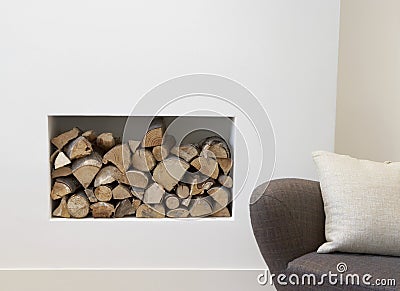 Empty Sofa with fire place behind Stock Photo