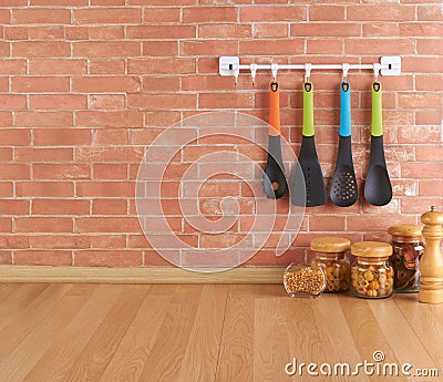 Empty space on the kitchen counter with utensils on hooks Stock Photo