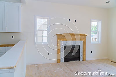 Empty spacious living room with fireplace new apartment Stock Photo