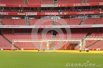Empty sports stadium with red seats Editorial Stock Photo