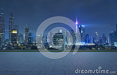 Empty square ground floor with city skyline Stock Photo