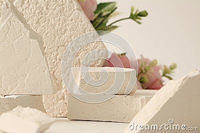 Empty stack of gypsum stones platform podium on beige background. Minimal empty display product presentation scene Stock Photo