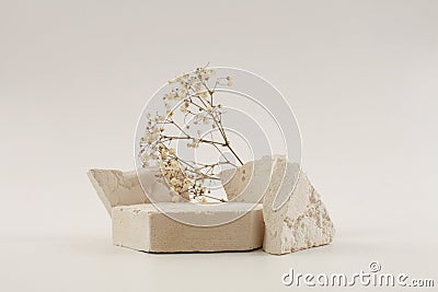 Empty stack of stones platform podium on beige background. Minimal empty display product presentation scene Stock Photo