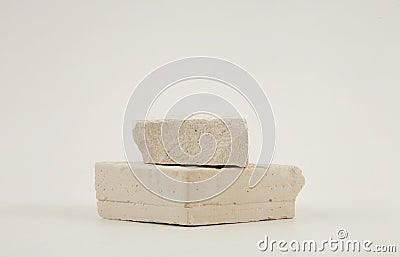 Empty stack of stones platform podium on beige background. Minimal empty display product presentation scene Stock Photo