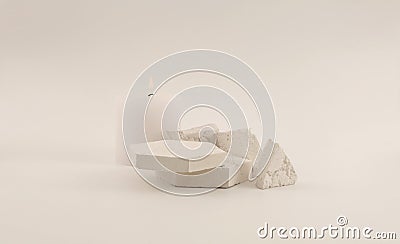 Empty stack of stones platform podium on beige background. Minimal empty display product presentation scene Stock Photo