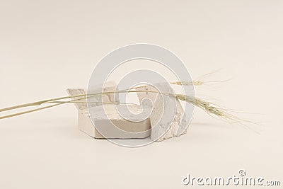 Empty stack of stones platform podium on light beige background. Minimal empty display product presentation scene Stock Photo