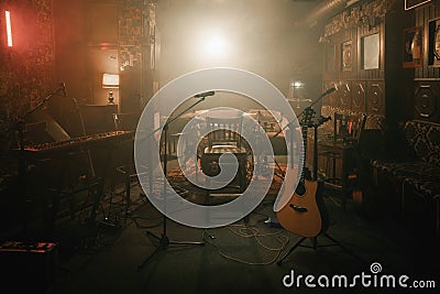 Empty stage of a small unplugged live music concert Stock Photo