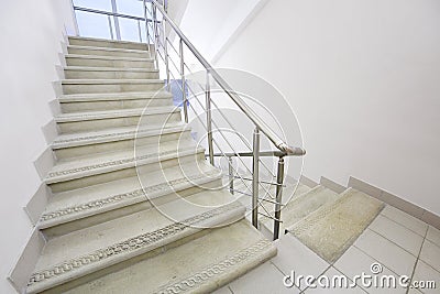 Empty staircase with metal railings Stock Photo