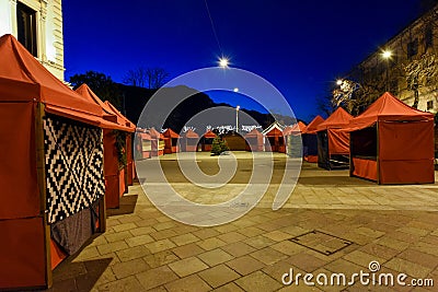 Empty stalls at night of the Christmas market of Lugano Stock Photo