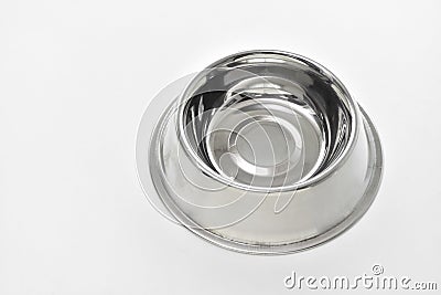 Empty steel bowl for dog food Stock Photo