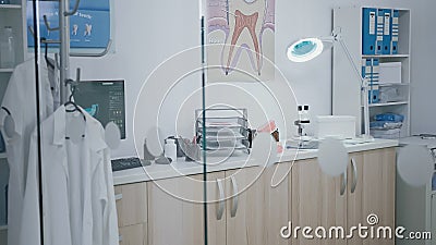 Empty stomatology orthodontic hospital cabinet with nobody in it equipped with modern furniture Stock Photo