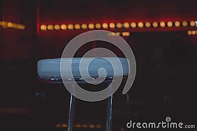 Empty stool in a stage with hollywood cinema theater lightning Stock Photo