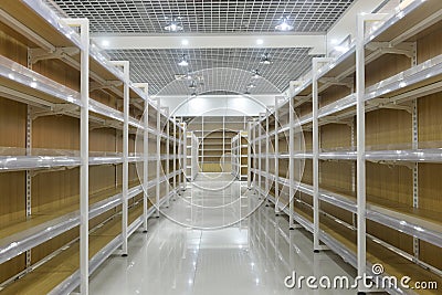 Empty shelves of supermarket interior Stock Photo