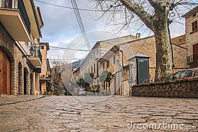 Empty street with cobble stones in Valldemossa, Mallorca, Spain Stock Photo