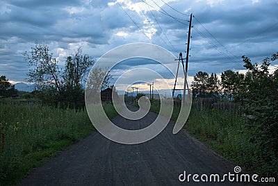 Empty streets of the remote village Kozyrevsk at sunset Stock Photo