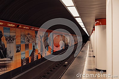 Empty subway platform with pictures of landmarks on the walls in Budapest, Hungary Editorial Stock Photo