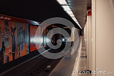 Empty subway platform with pictures of landmarks on the walls in Budapest, Hungary Editorial Stock Photo