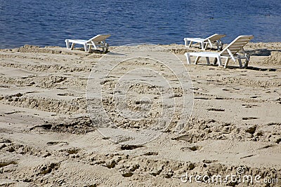 Empty sunbed on the beach. Stock Photo