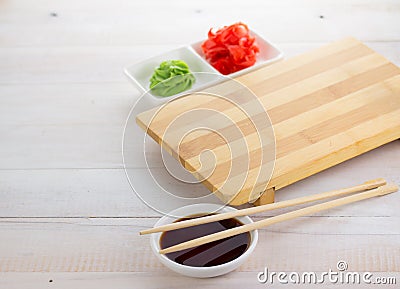 Empty sushi board with soy sauce ginger and wasabi Stock Photo
