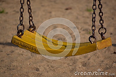 Empty swing in the outdoor garden park Stock Photo