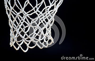 Empty Swooshing Basketball Net Close Up with Dark Background Stock Photo