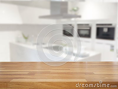 Empty table and blurred kitchen background Stock Photo