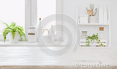 Empty table board and defocused modern kitchen wall background concept Stock Photo