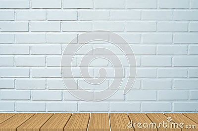 Empty table in front of white brick background. Stock Photo