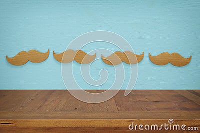 Empty table over paper mustache background. For product display Stock Photo