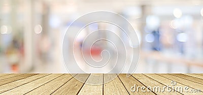 Empty table, perspective wood, over blurred store with bokeh background, product display montage background, banner Stock Photo