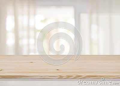 Empty table top on blurred view through abstract curtained window Stock Photo