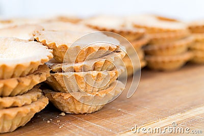 Empty Tartlets on Wooden Table Stock Photo