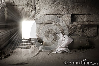 Empty tomb while light shines from the outside. Jesus Christ Resurrection. Christian Easter concept. Stock Photo