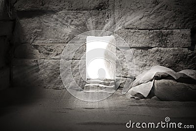 Empty tomb while light shines from the outside. Jesus Christ Resurrection. Christian Easter concept. Stock Photo