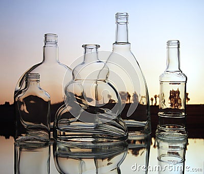 Empty transparent glass bottles forms Stock Photo