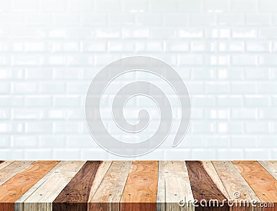 Empty tropical wood table and blur white ceramic tile brick wall Stock Photo