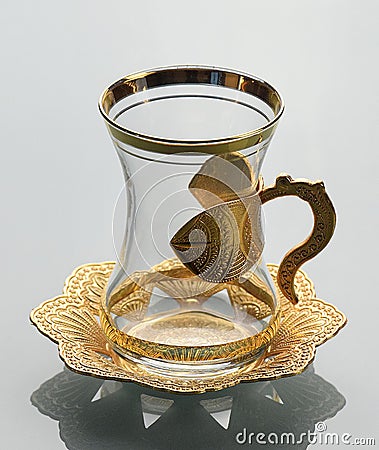 Empty tulip-shaped glass of tea Stock Photo