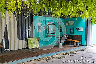 Empty turquoise hair salon and barber shop interior Bangkok Thailand Editorial Stock Photo