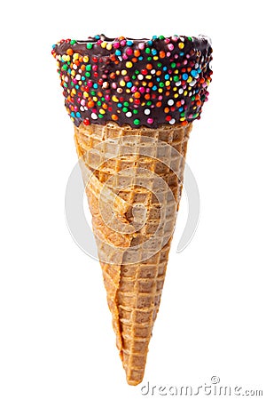 Empty wafer cone with chocolate icing and colorful sprinkles isolated on white background Stock Photo