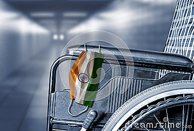 Empty Wheelchair in Hallway of Indian Hospital or Long Term Care Home Stock Photo