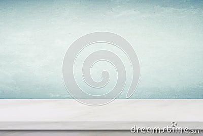 Empty white marble table over green cement wall background Stock Photo