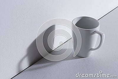 Empty white mug with shadow Stock Photo