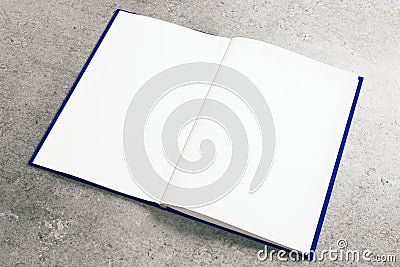 Empty white notepad on concrete surface Stock Photo