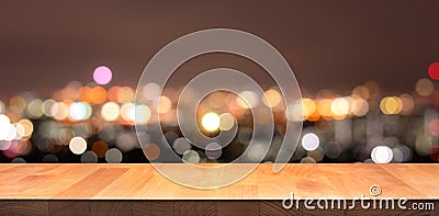Empty of white wood table top on blur night town,cityscape Stock Photo