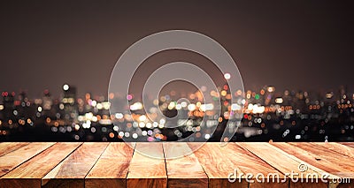 Empty of white wood table top on blur night town,cityscape Stock Photo