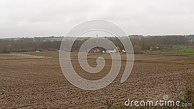 Empty winter fields and farm in the Wallonian countryside Stock Photo