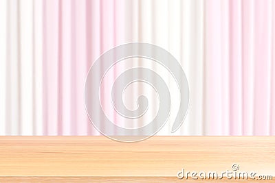 Empty wood table floors on blurred fabric wedding backdrop light pink and white curtain, wood table board empty front fabric pink Stock Photo